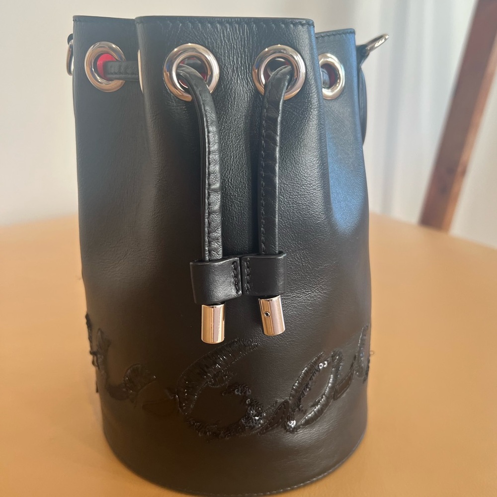 CHRISTIAN LOUBOUTIN
Marie Jane Black Leather Mini Bucket Bag - Picture 2 of 8